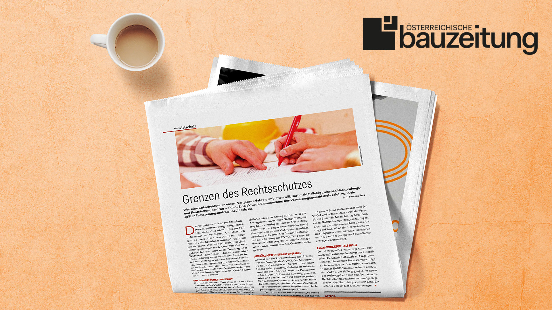 Zeitung liegt auf orangenem Grund. In der rechten oberen ecke ist das Logo der Österreichischen Bauzeitung.